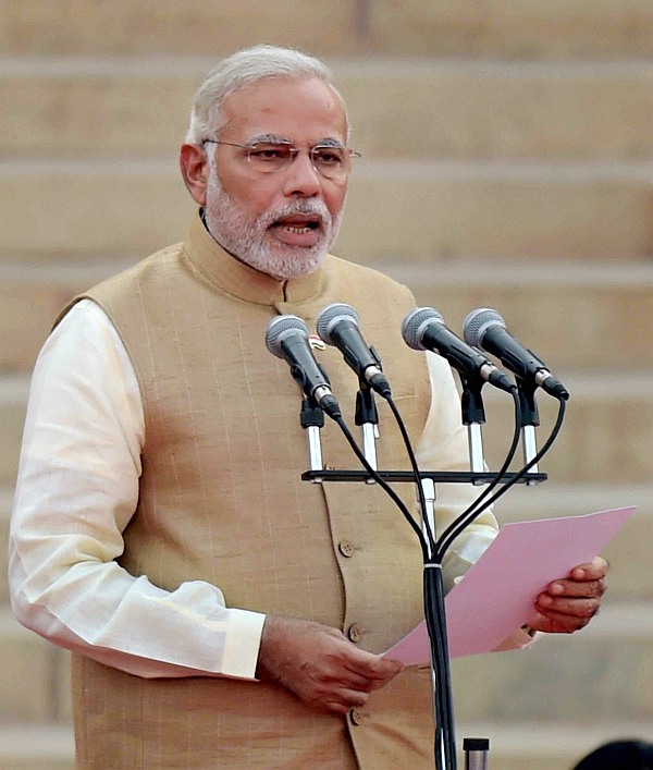 Narendra Modi taking oath as the 15th prime minister of India, at a ceremony at Rashtrapati Bhavan in New Delhi on Monday