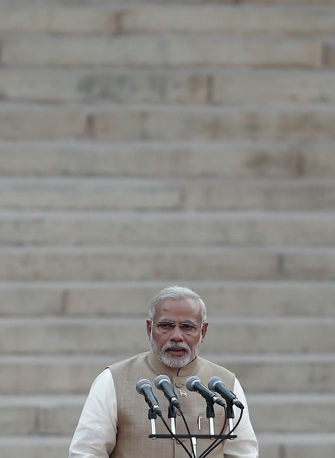 India's Prime Minister Narendra Modi takes his oath at the presidential palace in New Delhi India's Prime Minister Narendra Modi takes his oath at the presidential palace in New Delhi 