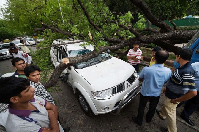 IN PHOTOS: Freak storm hits Delhi, kills 9 