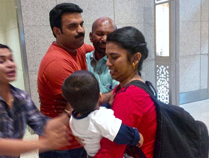 Family reunions after more than four years at the early hours of the morning at Mumbai airport