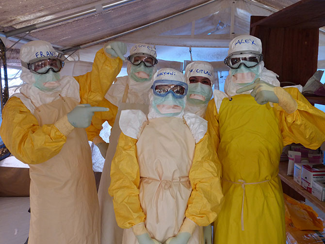 Dr Kalyani with the Medecins Sans Frontieres team in their protective gear in Foya, Liberia