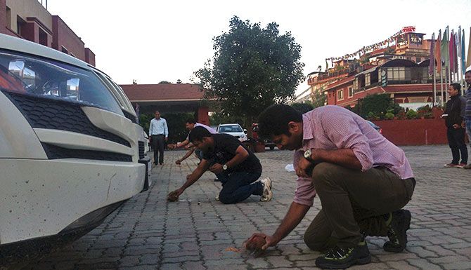 A puja and time to break a few coconuts -- one for each Mahindra SUV -- before setting out from Kathmandu.