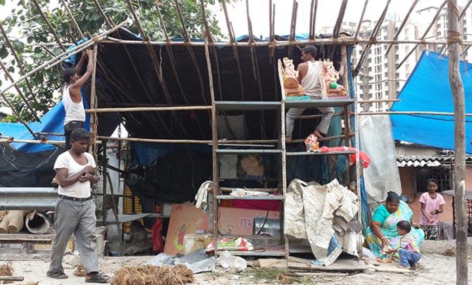 The temporary shops are dismantled on the last day of Ganesh Chaturthi.