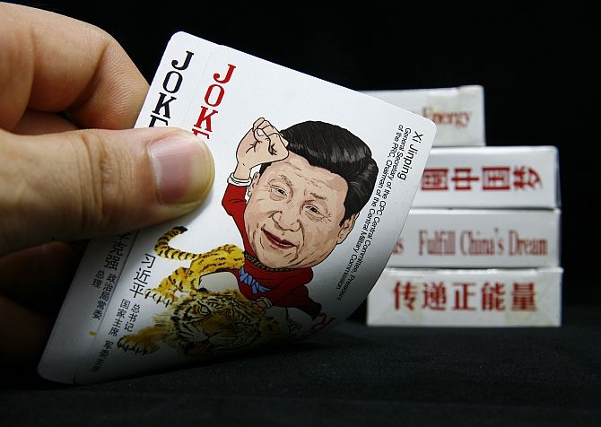 An image depicting Chinese President Xi Jinping is seen on the joker card of a set of cards featuring Chinese top political figures in this photo illustration taken in Beijing. Photograph: Karl Dong/Reuters