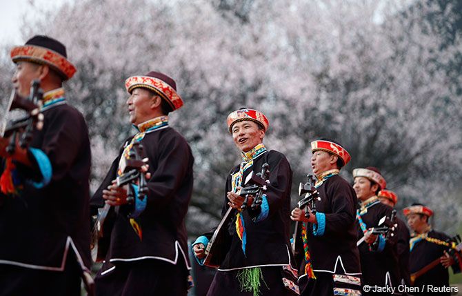 Tibetans play their traditional musical instruments to commemorate Serfs Emancipation Day in Nyingchi Prefecture, Tibet