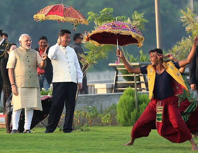 Prime Minister Narendra Modi and Chinese President Xi Jinping watch a cultural performance in Ahmedabad, September 17. Photograph: PTI Photo