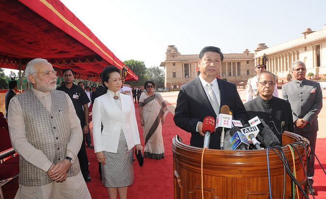 Prime Minister Narendra Modi with Chinese President Xi Jinping at Rashtrapati Bhavani. Photographs: MEA/Flickr