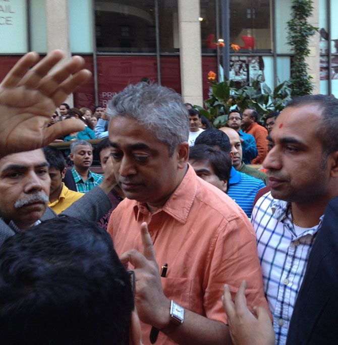 Rajdeep Sardesai being confonted by the hecklers. Photograph: Suman Guha Mozumder/Rediff.com