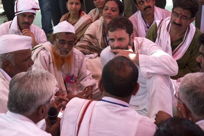 Rahul Gandhi interacts with villagers in Telangana.