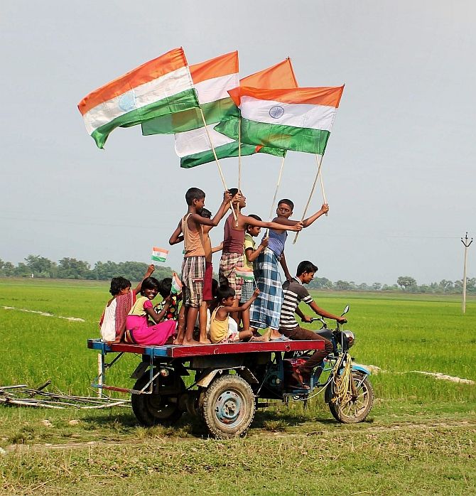 Village children show their patriotic spirit near Balurghat, West Bengal. Photograph: PTI Photo