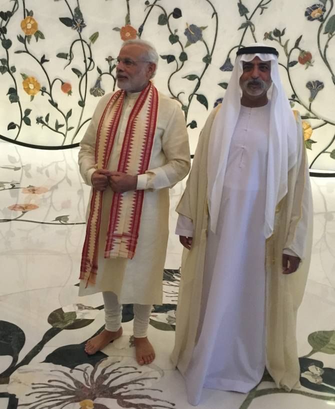Indian Prime Minister Narendra Modi with Sheikh Nahyan bin Mubarak, Minister of Culture, Youth and Community Developmentk, at the Sheikh Zayed Grand Mosque.