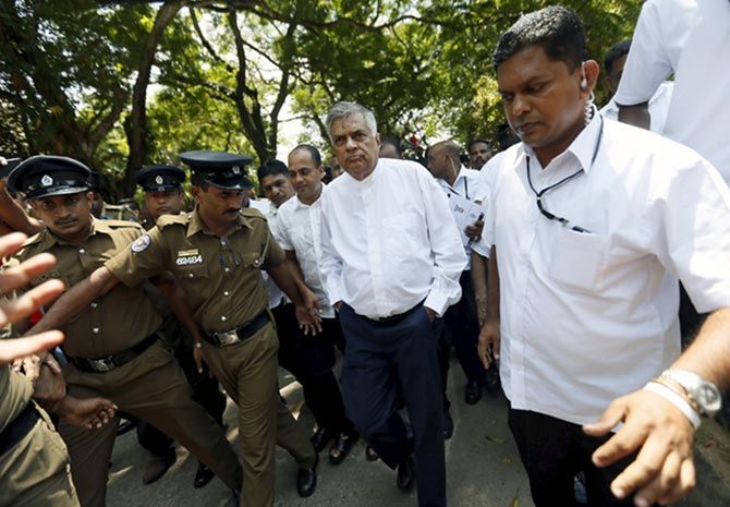 Sri Lankan Prime Minister Ranil Wickremesinghe arrives at a polling station in Colombo, August 17, 2015. Wickremesinghe's party won the most number of seats in the Sri Lankan parliamentary election and he will stay on as prime minister. Photograph: Dinuka Liyanawatte/Reuters.
