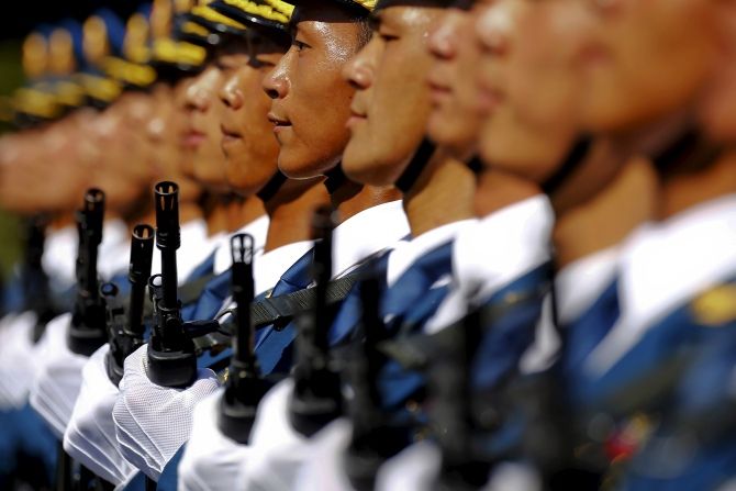 People's Liberation Army soldiers march in Beijing. Photograph: Damir Sagolj/Reuters