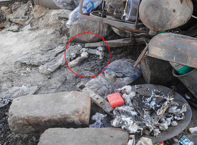 Sunita Nikalje pointed to this spot (circled, red) claiming it to be her father's mortal remains
