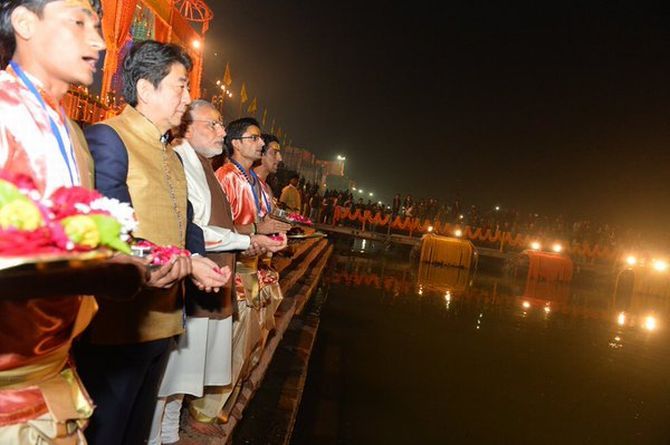 Prime Minister Narendra Damodardas Modi with Japanese Prime Minister Shinzo Abe at the Ganga Aarti in Varanasi, December 12, 2015. Photograph: PTI Photo