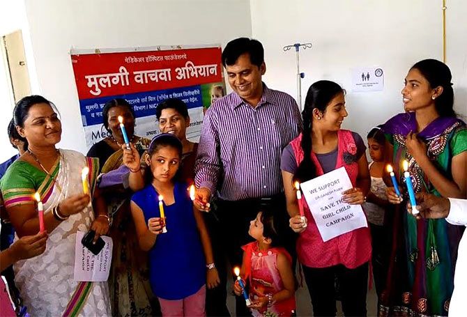 Dr Ganesh Rakh, a Pune doctor who delivers girl children free of charge, at a campaign to save the girl child.