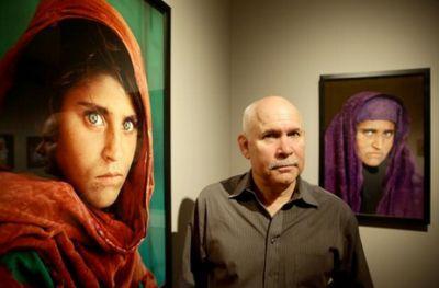 Photographer Steve McCurry with Sharbat Gula