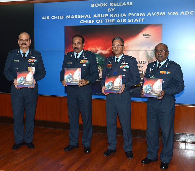 Air Chief Marshal Arup Raha, second from left, with Air Commodore Nitin Sathe, the author, second from right.