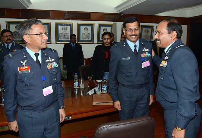 Air Chief Marshal Arup Raha, right, with Air Commodore Nitin Sathe, the author, left, and Air Commodore Krishna Kumar, centre, who won a Kirti Chakra for his heroism after the tsunami at the Car Nicobar air base.
