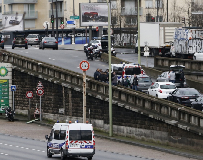 PHOTOS: Terror grips streets outside grocery shop in Paris - Rediff.com ...
