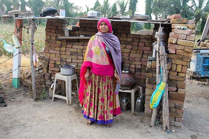 Migrant worker from north Gujarat in her makeshift field kitchen