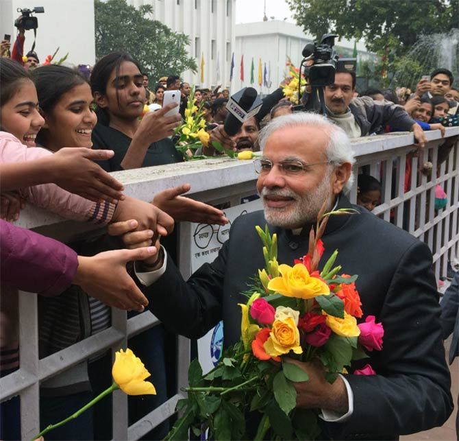 Prime Minister Narendra Modi greets girl children and young women on New Year's Day, in New Delhi, on January 1, 2015. Photograph: Press Information Bureau
