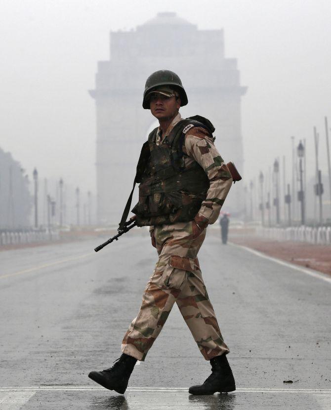 India Gate shrouded in smog ahead of this year's Republic Day. Photograph: Adnan Abidi/Reuters