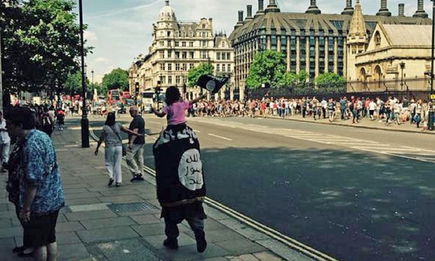 Man, child wave Islamic State flag outside UK Parliament - Rediff.com ...