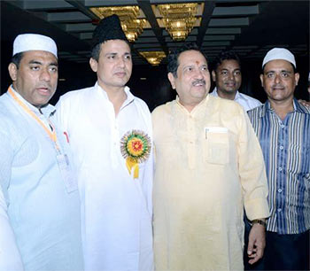Dr Imran Chaudhry, second from left, national co-convener,  Muslim Rashtriya Manch, with senior RSS leader Indresh Kumar, second from right, during the iftar organised on July 4