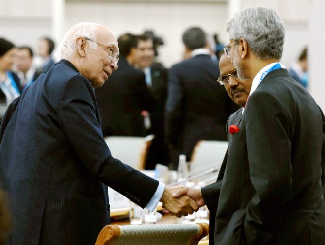 Foreign Secretary S Jaishankar with Sartaj Aziz and Ajit Doval.