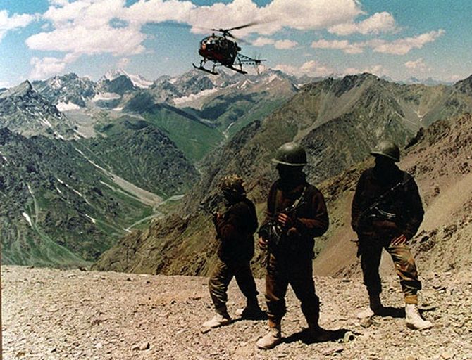 Indian armymen on a mountain peak in Kargil during the 1999 war. Rediff Archives