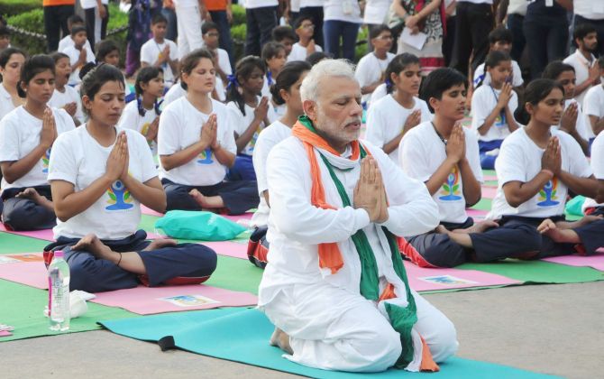 PHOTOS: Top 12 'asanas' that Modi practised on Yoga Day - Rediff.com