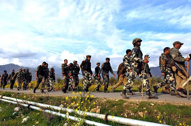 Soldiers after a gun battle with terrorists in J&K