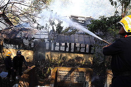 Firemen battle the blaze in Kalbadevi
