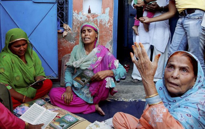 Relatives mourn Mohammad Akhlaq who was lynched by a mob in Bisara village. Photograph: PTI