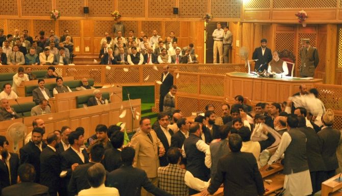 The Jammu and Kashmir government has said it will protect the special status granted to the state under the Constitution. 'We are here to safeguard and protect Article 370 and Article 35A,' then law minister Basharat Bukhari told the J&K assembly on October 6, 2015. Photograph: Umar Ganie