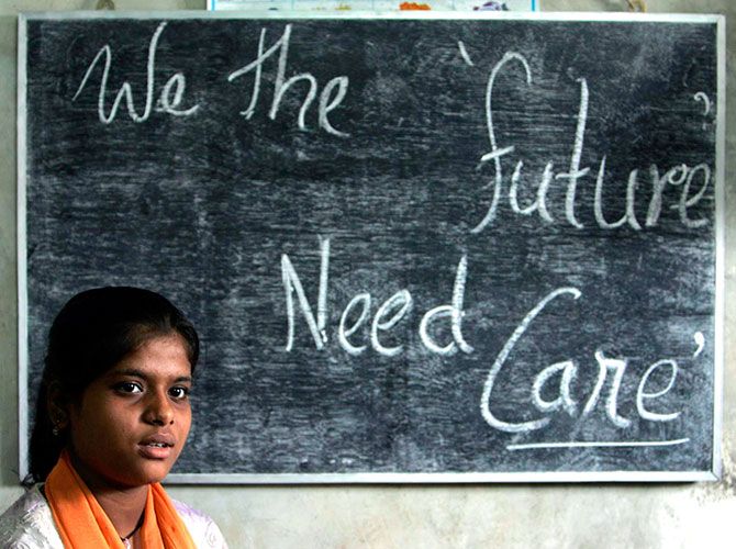In this September 5, 2007 image, Rekha Sharma, 13, a house servant, attends a class at Sishu Sikha Niketa', a school for child labourers in Siliguri. The school, along with Ananda Vidya Mandir, another school for child labourers, is run by the Liberal Association for Movement of People, LAMP. Photograph/Rupak De Chowdhuri/Reuters