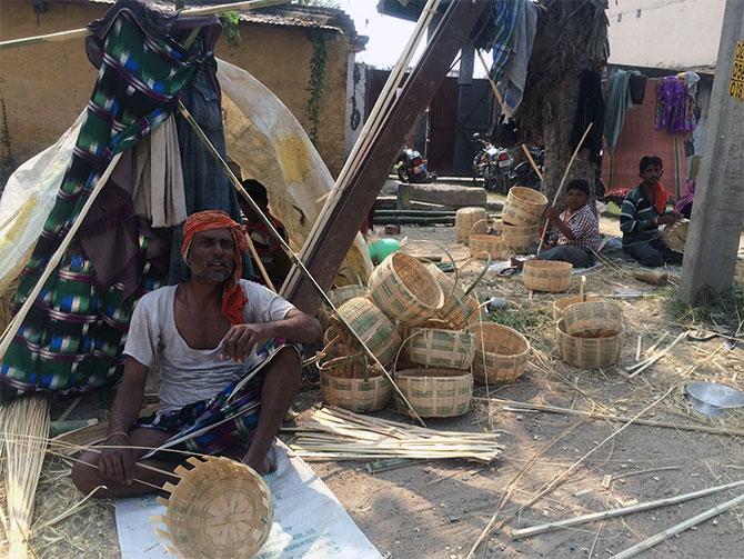 A family selling baskets made of bamboo strips