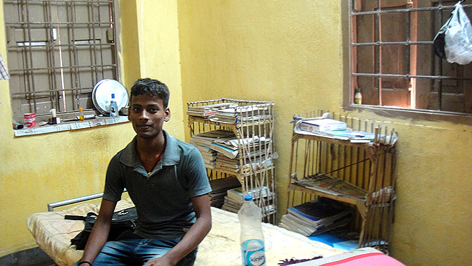 Manjit on his hostel bed