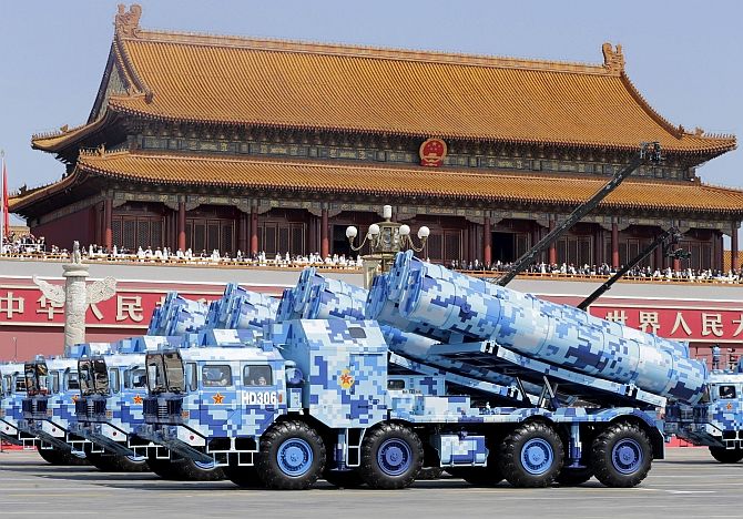 China displayed over 500 pieces of latest weaponry and nearly 200 aircraft of about 20 different models at the September 3 military parade. Military vehicles carrying shore-to-ship missiles drive past Tiananmen Gate. Photograph: Jason Lee/Reuters
