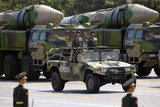 Military vehicles carry DF-21D ballistic missiles roll to Tiananmen Square during the military parade to mark the 70th anniversary of the end of World War II in Beijing, September 3. Photograph: Damir Sagol/Reuters