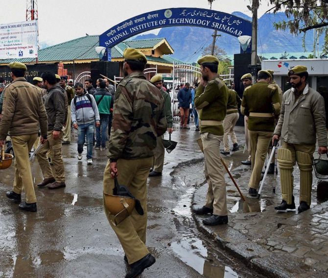 Police and CRPF personnel deployed at National Institute of Technology following tensions between the local and non-local students of the institute, in Srinagar. Photograph: S Irfan/PTI