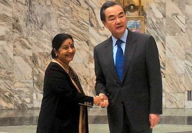 External Affairs Minister Sushma Swaraj with her Chinese counterpart Wang Yi. Photograph: MEA/PTI