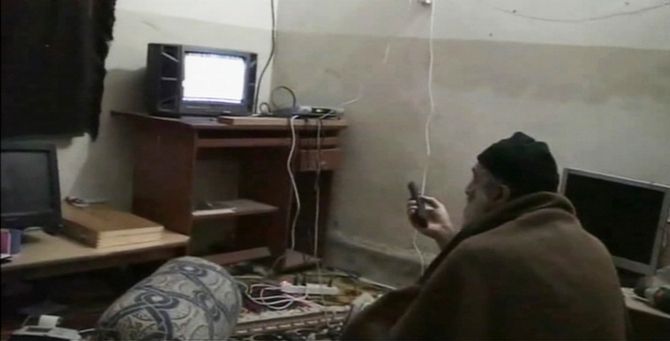 Osama bin Laden is shown watching himself on television in this video frame grab. Photograph: Pentagon/Reuters