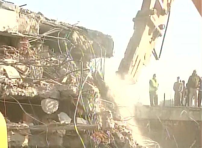 2 dead, many feared trapped in Hyderabad building collapse - Rediff.com ...