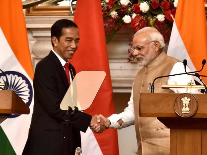 Indonesian President Joko Widodo with Prime Minister Narendra Damodardas Modi
