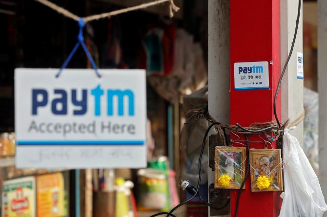 Lukewarm debut for Paytm shares on bourses