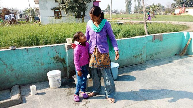 Martyr Mohan Nath Goswami's wife and daughter