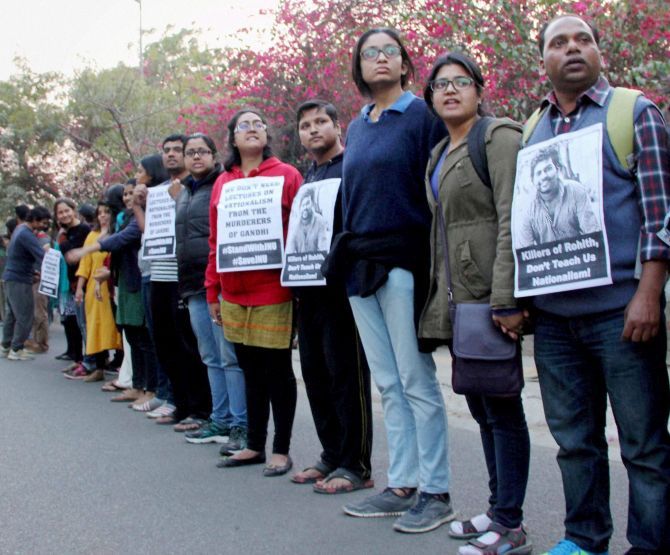 Students and faculty at JNU form a human chain demanding the release of students' union president Kanhaiya Kumar from jail. Photograph: PTI