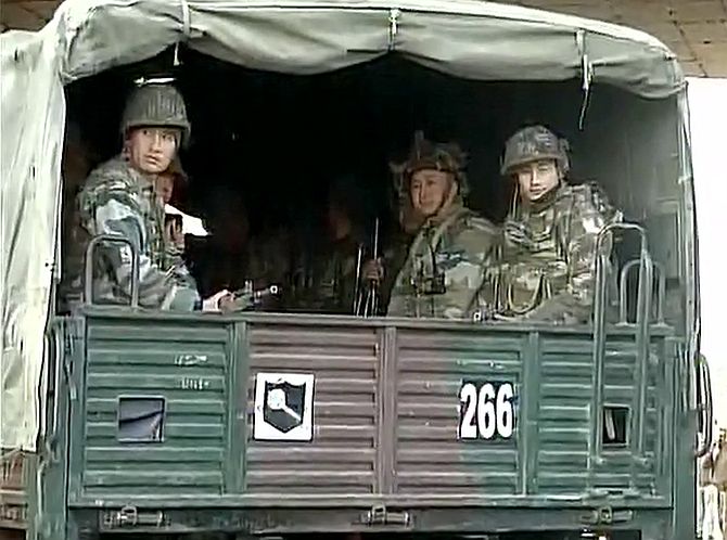 Security personnel outside the Indian Air Force's Pathankot air station.